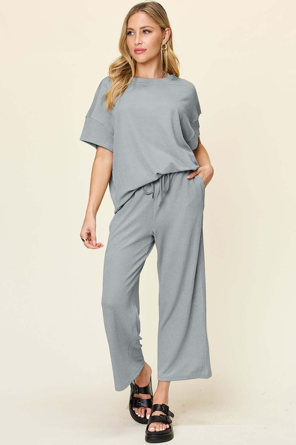 DOUBLE TAKE Full Size Texture Round Neck Short Sleeve T-Shirt and Wide Leg Pants at Bella Road