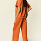 DOUBLE TAKE Full Size Texture Half Zip Short Sleeve Top and Pants Set at Bella Road