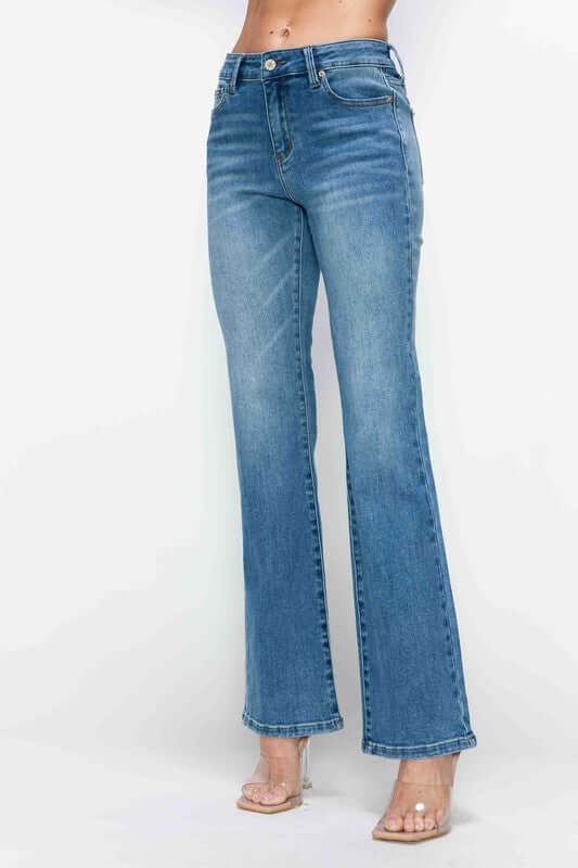 Stylish mid-rise bootcut jeans with playful cat's whiskers detailing, perfect for any occasion.