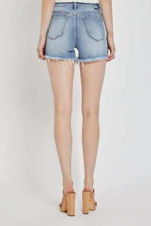 High rise distressed denim shorts by Risen Jeans, perfect for summer with a flattering fit and casual, edgy vibe.