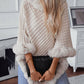 Bella Road Fuzzy Trim Poncho with three-quarter sleeves, perfect for chilly days, styled with a chic black clutch.