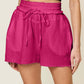 DOUBLE TAKE Full Size Texture Raw Trim Drawstring Shorts at Bella Road