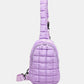 Lavender quilted nylon crossbody bag with a puffy design, perfect for stylish adventures. Medium-sized and lightweight for trendy outfits.