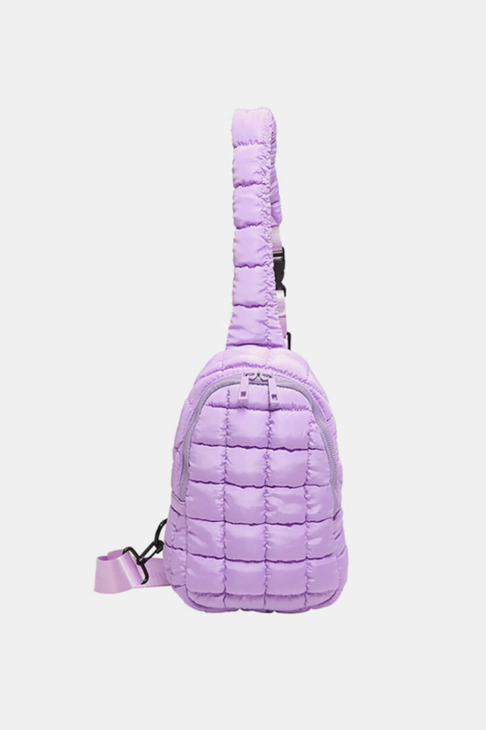 Lavender quilted nylon crossbody bag with a puffy design, perfect for stylish adventures. Medium-sized and lightweight for trendy outfits.