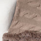 Cozy Bella Road Fuzzy Hem Cable-Knit Poncho in warm taupe, featuring a stylish braided pattern and soft fur hem.