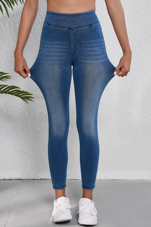 Woman wearing high waist skinny jeans showcasing the stretchiness of the fabric