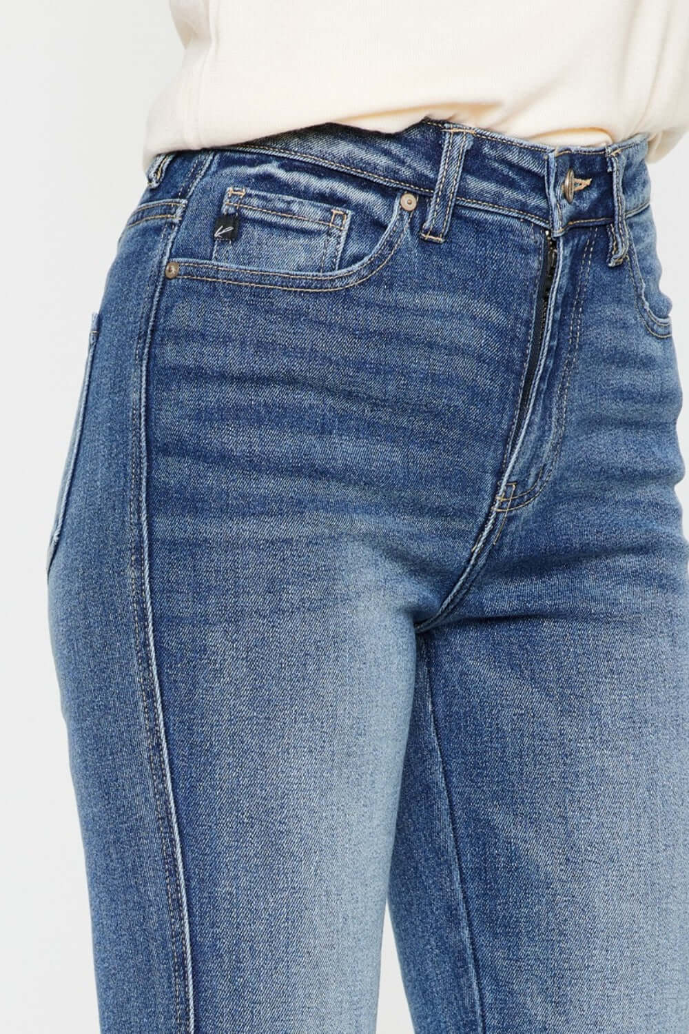 Close-up of Cat's Whiskers High Waist Flare Jeans with pocketed design, showcasing high-waist and trendy denim details