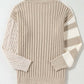 Bella Road cable-knit color block round neck sweater in tan, featuring unique knit patterns on sleeves, perfect for a cozy, stylish look.