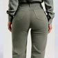 Back view of Buttoned Raw Hem Jeans with Pockets in green, showcasing slightly stretchy fit and comfortable design.