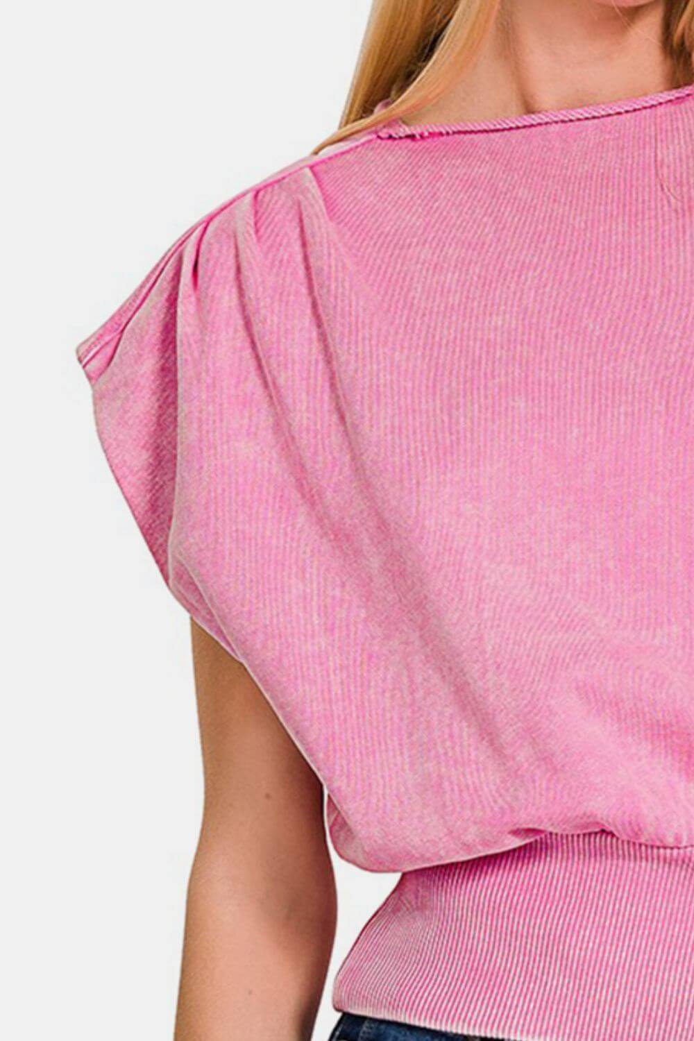 Pink washed boat neck dolman sleeve top with bottom banded hem for a chic and stylish casual look