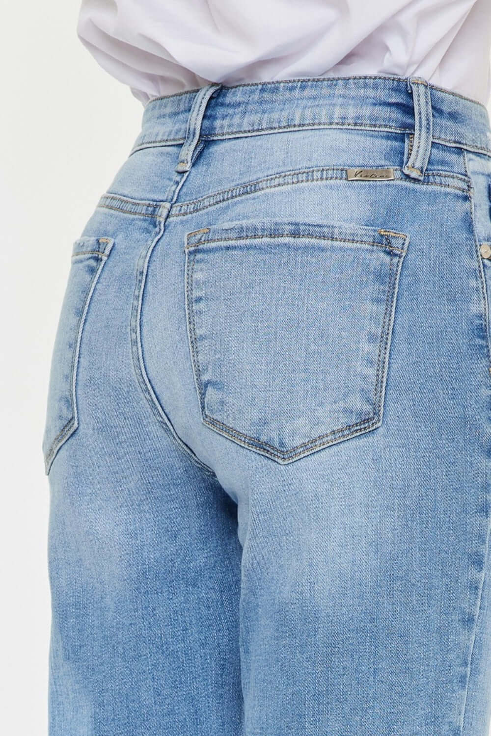 High Waist Raw Hem Straight Jeans rear view showcasing light blue denim and flattering fit. Perfect addition to your denim collection.