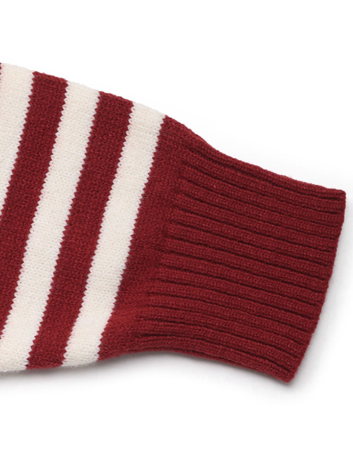 Close-up of the burgundy and white striped cuff on the Perfee Long Sleeve Hooded Sweater, highlighting its knit texture.