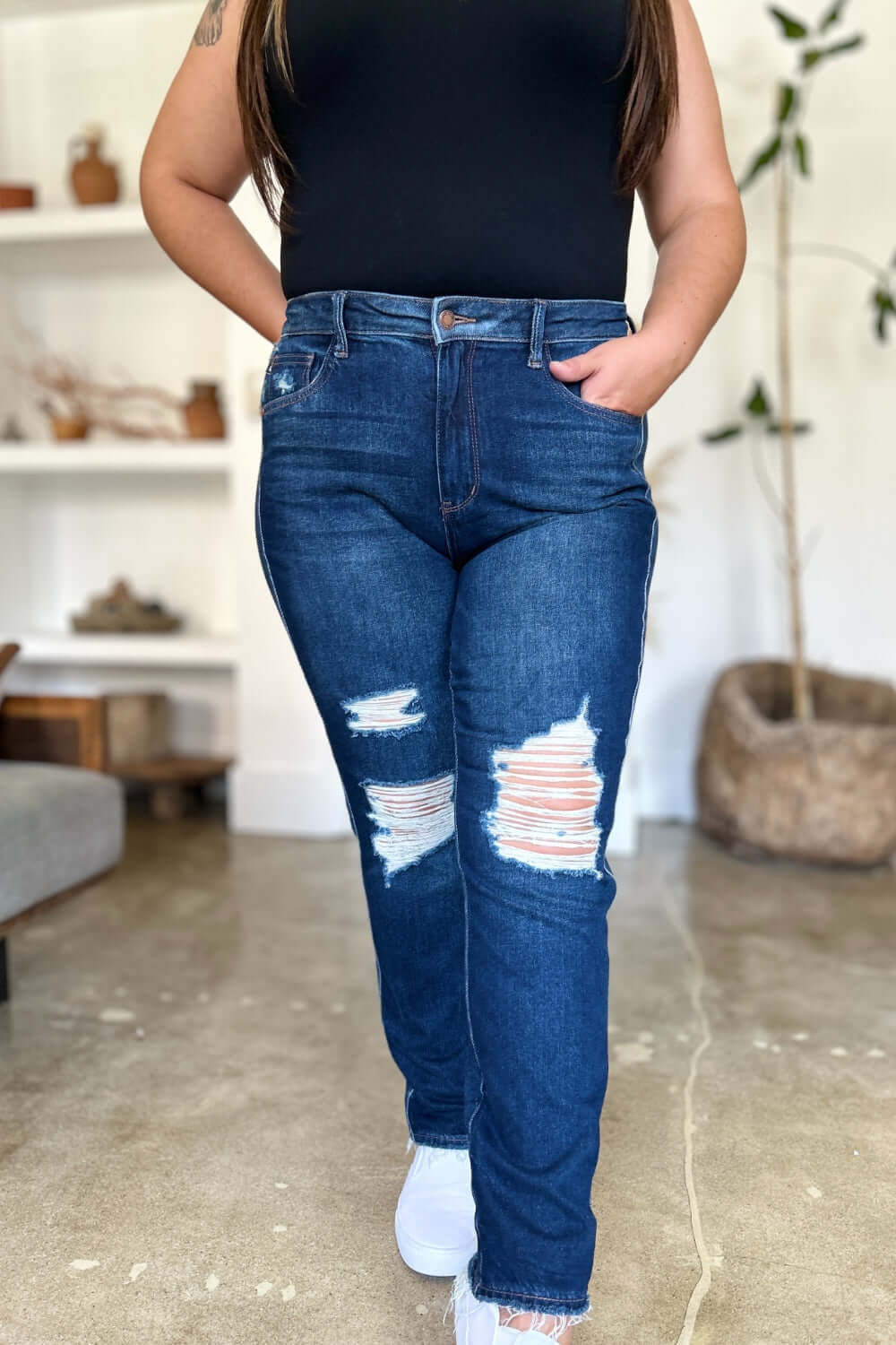 Woman wearing Judy Blue High Waist Rigid Magic Heavy Destroy Straight Jeans showing front distressed design and straight-leg cut