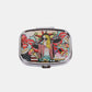 Nicole Lee USA Print Metallic Rectangular Pill Case with signature print, compact design, and push lock closure.