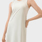 Millennia Round Neck Sleeveless Active Dress in cream, perfect for workouts with a comfortable, stylish design.