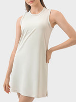 Millennia Round Neck Sleeveless Active Dress in cream, perfect for workouts with a comfortable, stylish design.