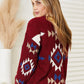 Woman wearing HEYSON Full Size Aztec Soft Fuzzy Sweater, showcasing vibrant Aztec pattern and cozy fuzzy texture.