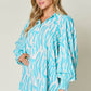 DOUBLE TAKE Full Size Printed Smocked Long Sleeve Blouse at Bella Road