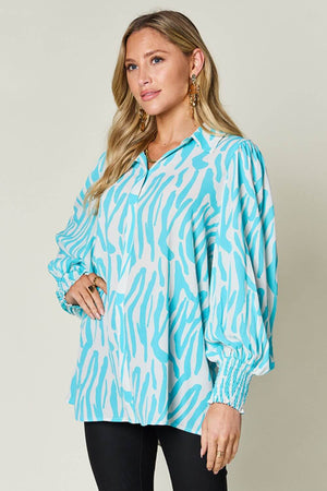 DOUBLE TAKE Full Size Printed Smocked Long Sleeve Blouse at Bella Road