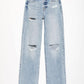 Bella Road distressed straight leg jeans with pockets in light blue denim, featuring ripped details and a button closure.