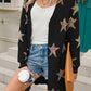 Woman wearing Angel Wings Star Open Front Long Sleeve Cardigan with colorful star patterns, holding coffee and looking stylishly cozy.