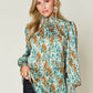 DOUBLE TAKE Full Size Printed Smocked Long Sleeve Blouse at Bella Road