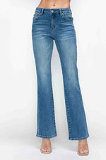 Stylish mid-rise bootcut jeans in blue, featuring elegant flared legs and a flattering fit for all body types.