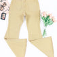 Back view of Bella Road Pocketed Raw Hem Flare Jeans in beige with flowers and makeup on the side.