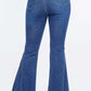 High waist curvy flare jeans with elastic banded waist, slim fit, and retro flare bottom in blue denim material viewed from the back.