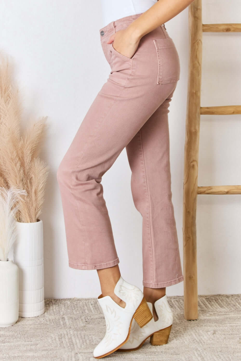 High Rise Ankle Flare Jeans in pink showcasing a chic, modern style with a flattering silhouette and slight stretch. Risen Jeans.