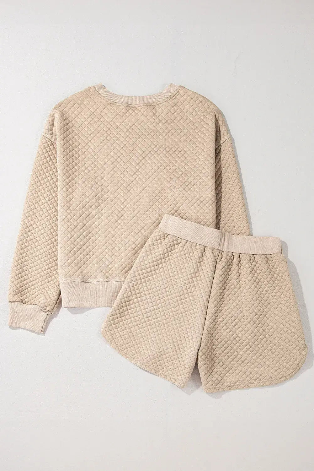 Cozy Bella Road quilted two-piece set with round neck top and shorts in soft beige, perfect for lounging or casual outings.