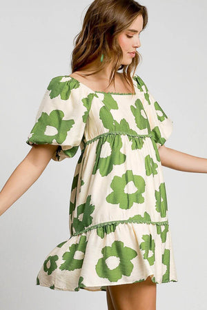 Umgee plus size floral mini dress with short sleeves, featuring bold green flowers on a light background for a vibrant look.