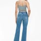 Back view of a model in bytos Raw Hem Distressed Mid Rise Crop Jeans, showcasing trendy cropped length and raw hem.