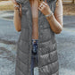 Woman wearing Bella Road Longline Hooded Sleeveless Puffer Vest, perfect for stylish outdoor adventures.