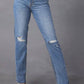 Distressed raw hem straight jeans with pockets, moderate stretch, trendy casual chic denim pants with ripped knees, front view.