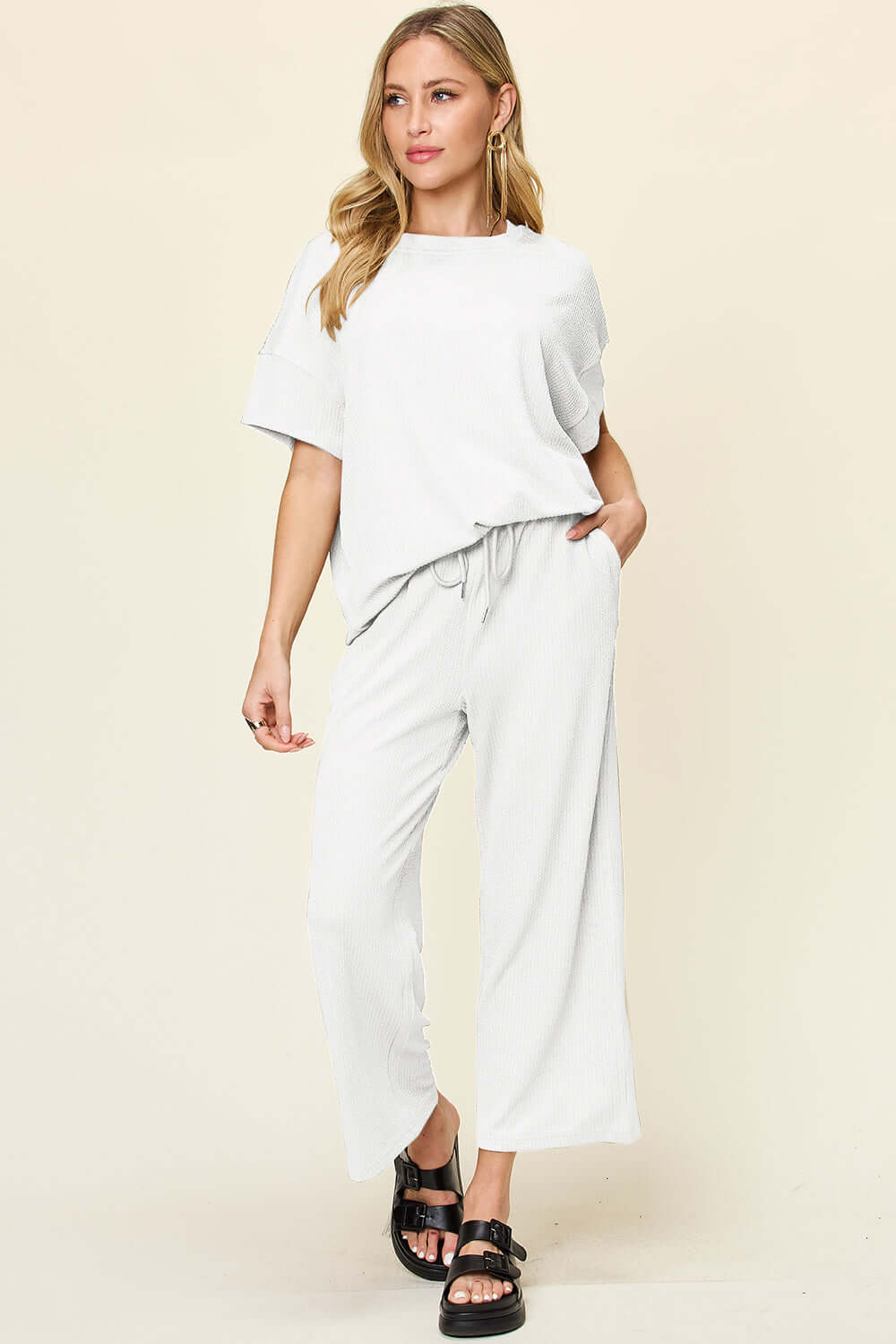 DOUBLE TAKE Full Size Texture Round Neck Short Sleeve T-Shirt and Wide Leg Pants at Bella Road