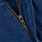 Close-up of zipper on straight jeans with pockets made from stretchy polyester, cotton, and elastane blend.