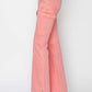 High-rise side slit cargo bootcut jeans in pink featuring flattering high waist and utilitarian pockets by Risen Jeans.