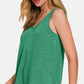 Woman wearing a green Curved Hem Round Neck Tank with denim shorts, ideal for a casual and chic summer look