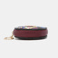 Elegant Nicole Lee USA keychain round coin purse showcasing vibrant design and durable material for stylish organization.