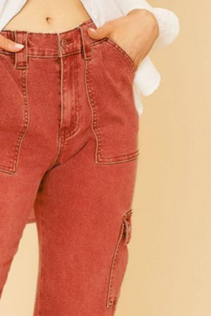 Stylish straight leg cargo jeans in a rich red hue, perfect for casual outfits and outdoor adventures.