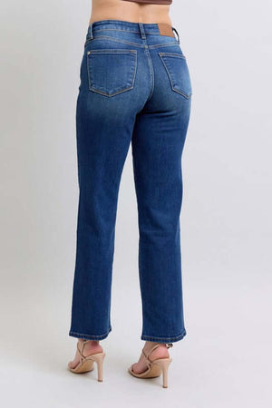 Back view of Judy Blue Full Size Straight Jeans showcasing side seam detail and pockets, styled with heeled sandals.