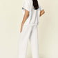 DOUBLE TAKE Full Size Texture Half Zip Short Sleeve Top and Pants Set at Bella Road