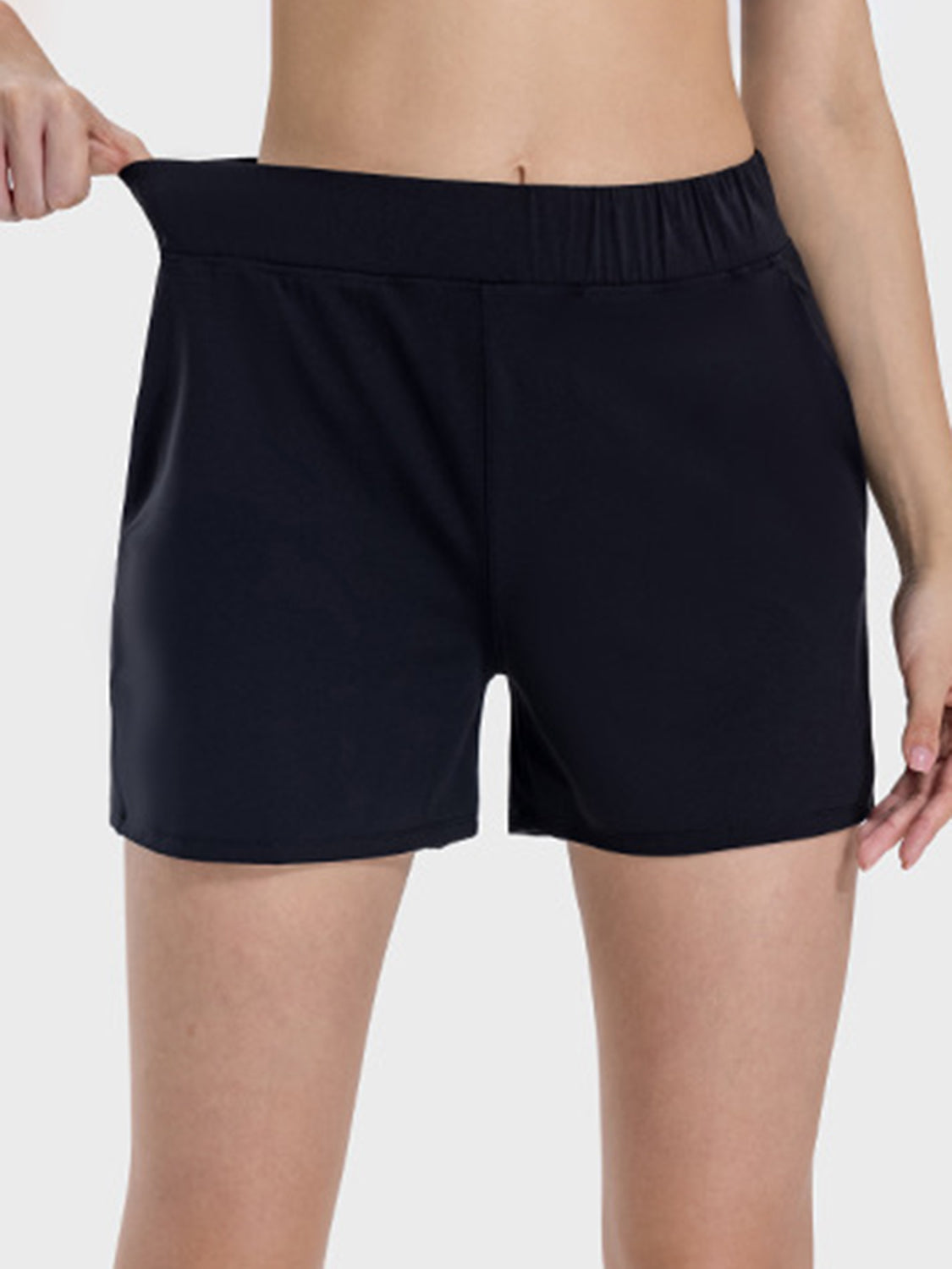 Millennia elastic waist active shorts, featuring a comfortable fit and moderate stretch, perfect for workouts and leisure.