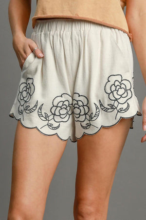 Umgee plus size linen blend shorts with floral embroidery, lightweight and perfect for summer, featuring pocket detail.