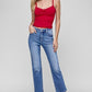 Model showcasing RISEN Full Size Tummy Control High Rise Crop Straight Jeans in light wash blue.