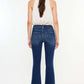 Woman wearing Cat's Whiskers Raw Hem Flare Jeans viewed from the back, showing the pocketed design and flare cut.