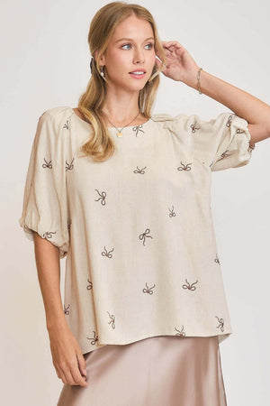 Umgee plus size linen blend top with delicate ribbon embroidery, perfect for warm weather and stylish comfort.