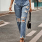 Bella Road Distressed Raw Hem Jeans with Pockets worn by a model, showcasing the stylish design and slightly stretchy fit