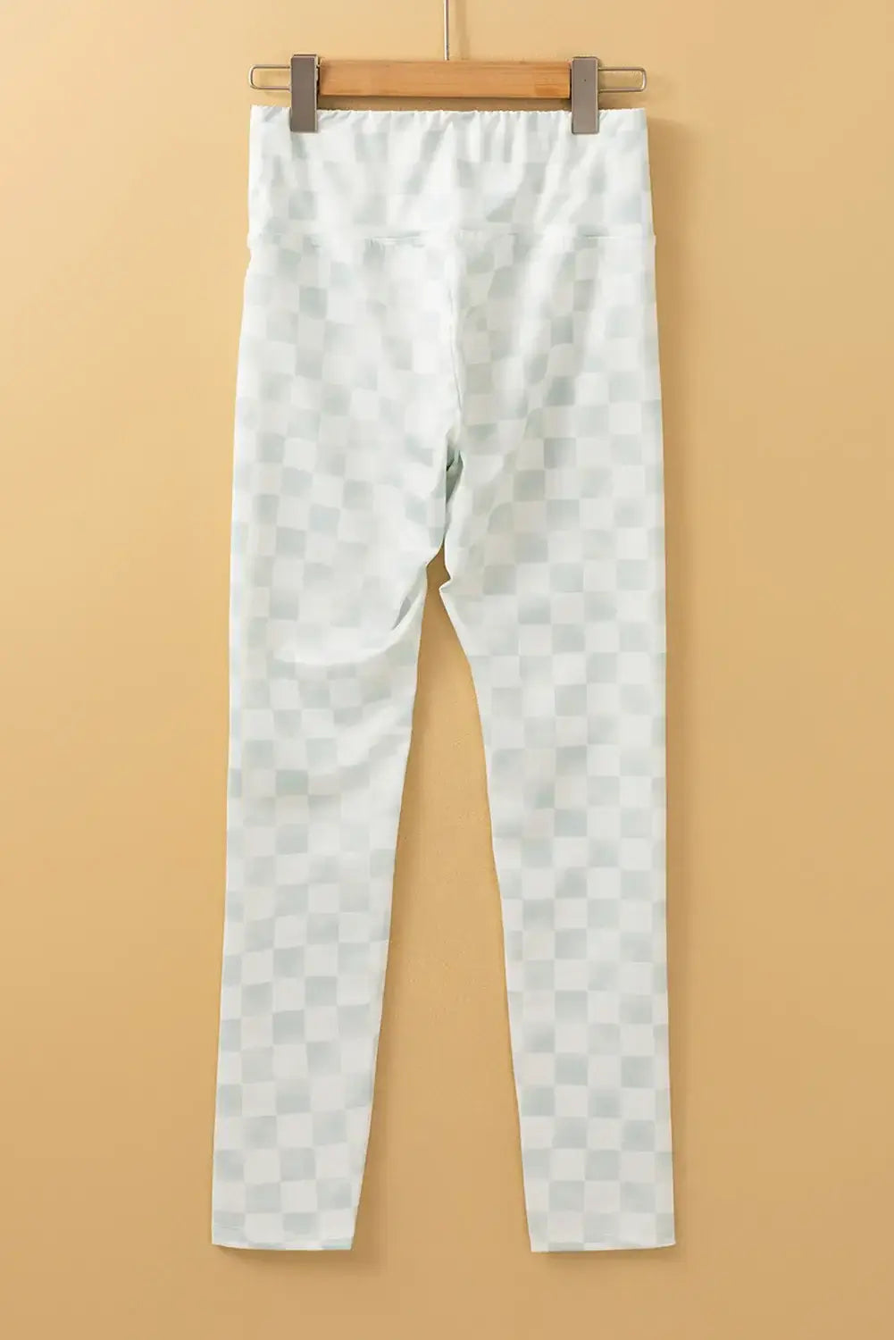 Bella Road checkered elastic waist leggings with white pattern on hanger